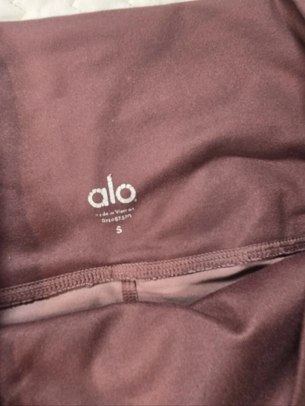 ALO Yoga Mauve Crop Leggings with Black Knee Stripes